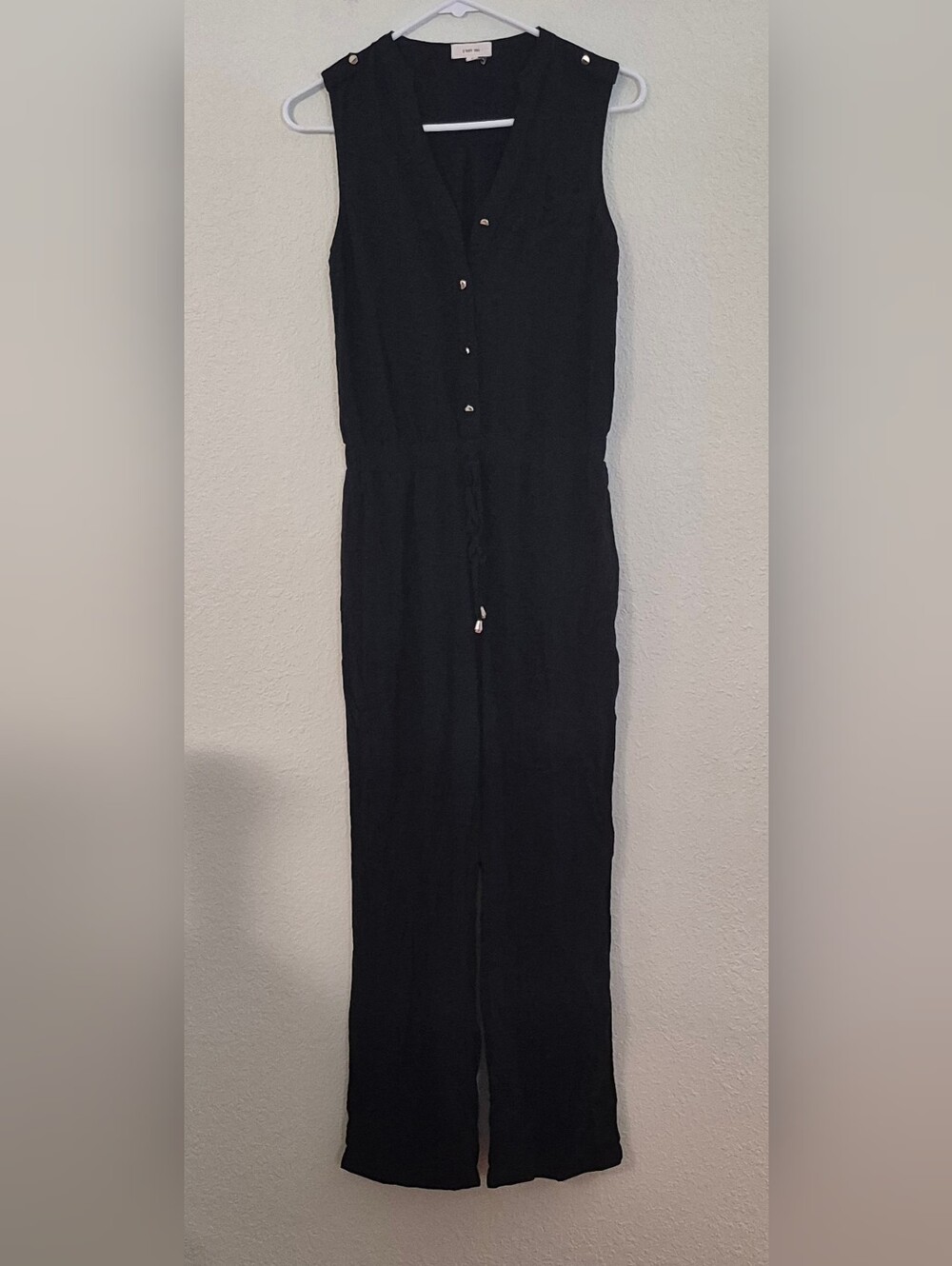 Sleeveless Black Button-Front Jumpsuit with Drawstring Waist